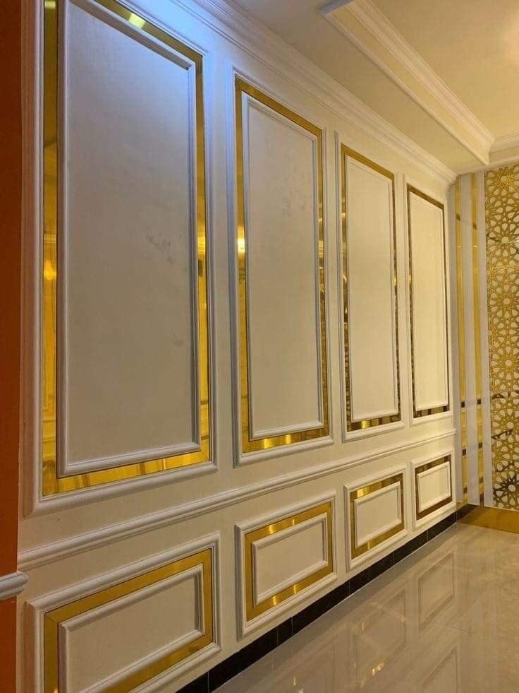 Interior detail, gold panelling by Rupesh Interio